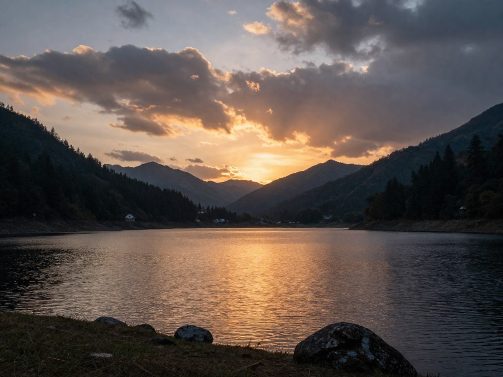 Mountain lake at sunset, dramatic clouds